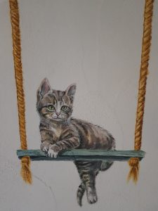 Wandmalerei Detail mit Katze